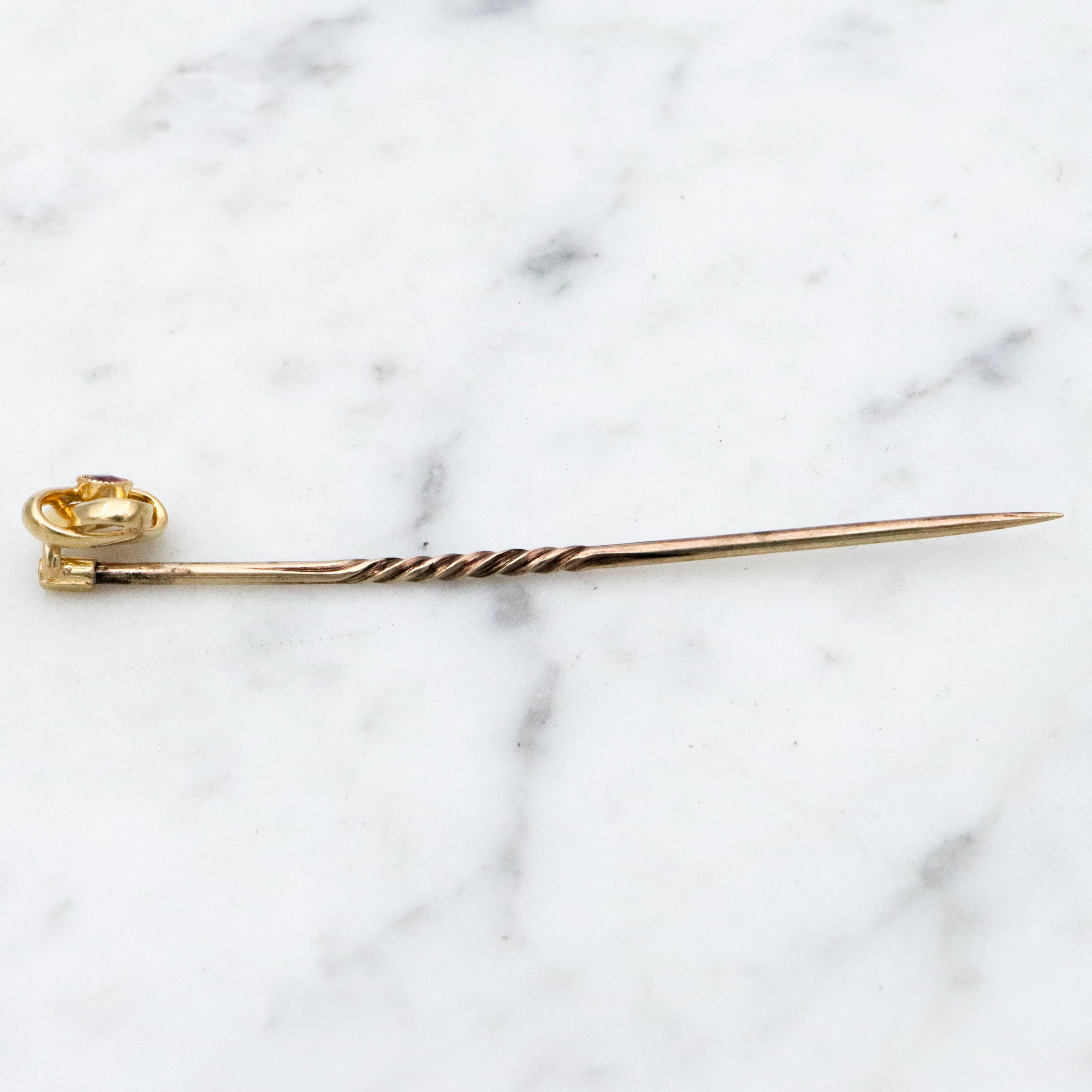 Antique Victorian 15k gold ruby infinity knot stick pin